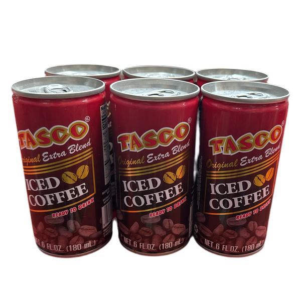 four cans of iced coffee sitting next to each other