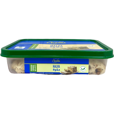 Cortas halva with pistachios displayed in a decorative setting, perfect for dessert lovers.