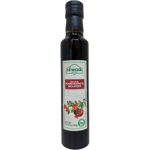 Alwadi natural pomegranate molasses, no added sugar - a bottle of premium quality molasses ideal for healthy cooking and dressings.