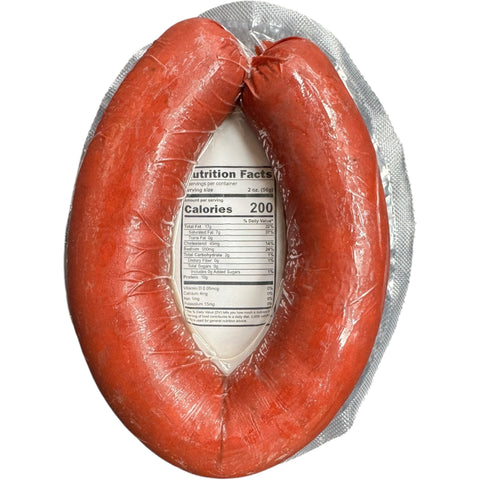 CUMBORIYET SUCUK 1lb Turkish sucuk sausage served on a cutting board, highlighting its rich texture and flavor.