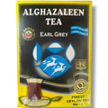 Alghazaleen Earl Grey tea leaves in a decorative bowl, showcasing the high-quality ingredients for brewing an aromatic beverage.