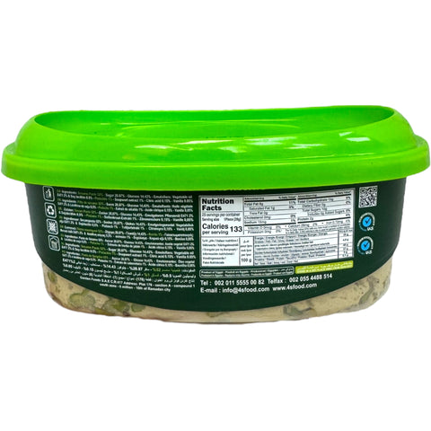 Close-up of Four season halva with pistachios 700g - Rich and creamy halva with pistachios showcasing its unique texture and flavor.