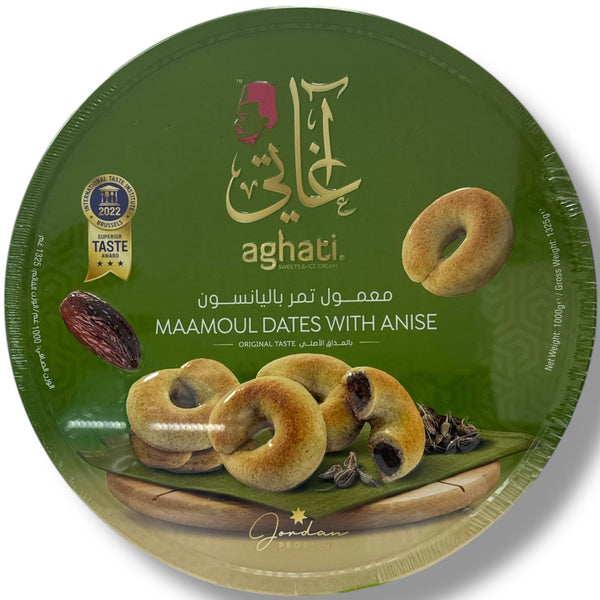 Round green tin of Aghati Maamoul Dates with Anise featuring traditional Middle Eastern cookies filled with dates and anise, 1KG package.