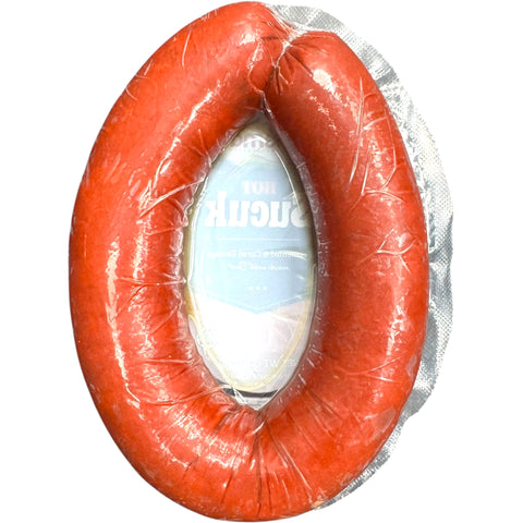 Close-up of Nema hot sucuk 1lb, showcasing its rich texture and savory spices.