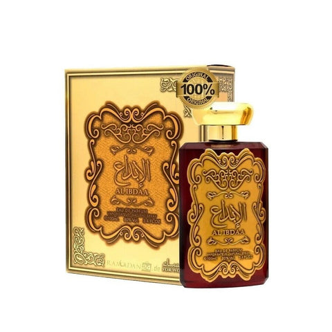 Alibdaa Signature Perfume by ALBASHA Market, featuring an elegant design with a luxurious gold and red bottle alongside its ornate packaging. This 100ml fragrance is categorized as an exotic floral scent for women, exemplifying elegance and sophistication. Perfume
