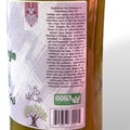 1 Ltr Palestinian Extra Virgin Olive Oil bottle next to fresh ingredients, representing its versatility in various culinary recipes.