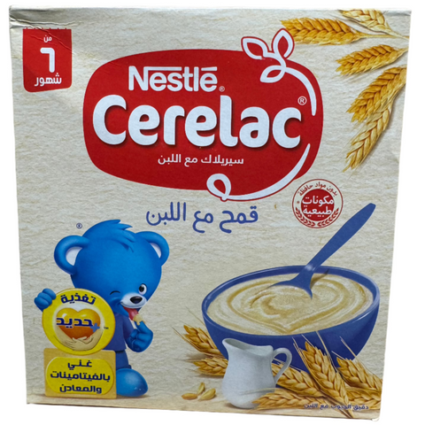 Nestle Cerelac Wheat - Milk 250 Gm product packaging featuring a blue bear character and showcasing the nutritious wheat and milk contents. Nestle branded.