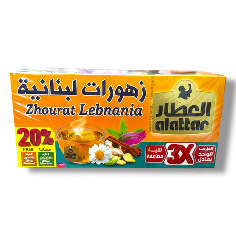 Alattar Lebnania Zhourat bags featuring a vibrant packaging design that prominently displays the product name, emphasizing its authenticity as a Lebanese herbal blend. The packaging includes images of the herbal ingredients like chamomile, ginger, and cinnamon, showcasing its rich flavor profile ideal for cooking.