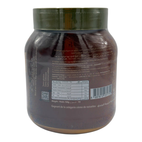 Back view of Cebon El Mordjene 700 g Hazelnut Chocolate Spread - CREME DE CACAO ET DE NOISETTES by elmordjene, highlighting nutritional information of this gourmet chocolate spread.
