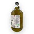 Serving suggestion with Palestinian Extra Virgin Olive Oil showcasing the premium quality olive oil drizzled over a salad.