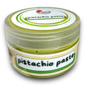 Turkish pistachio paste in a round container labeled as 'pistachio paste', showcasing a rich green color, ideal for culinary use.