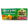 Alattar Wild Thyme packaging featuring a transparent glass of brewed wild thyme tea, with vibrant green leaves surrounding it. The box prominently displays the product name in Arabic and English, highlighting a 20% free offer and suggesting a value of three times the individual tea bag quantity.