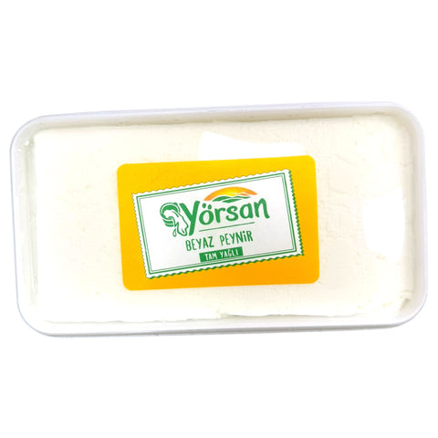 Lifestyle image of Yorsan Full Fa White Cheese 750g being enjoyed in a meal, illustrating its versatility and delicious taste.