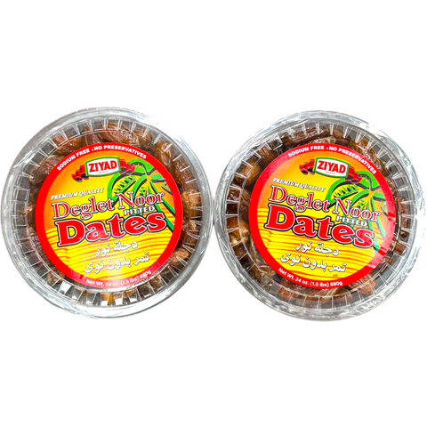 Ziyad Deglt Nour dates on a wooden table, promoting the authentic taste of Ziyad Tunisia Deglt Nour dates.