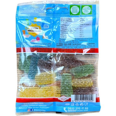 Close-up of Haribo Ekşi Likör (Sour Liquorice Gummies), highlighting the texture and vibrant color of these halal beef gelatin candies.