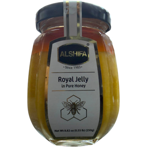 Alshifa Royal Jelly in Pure Honey 5% – 250g, Premium Natural Nutrient Rich Supplement displayed in a beautiful jar showcasing its rich texture and vibrant color.