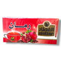 Alattar Pomegranate Bags packaging featuring vibrant red colors, a transparent window displaying pomegranates, and a cup of pomegranate tea. The brand logo is prominently displayed, showcasing the health benefits of the nutrient-rich superfruit.