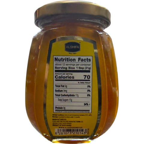 Close-up of Alshifa Natural Honey – 250g highlighting its rich texture and golden color, perfect for health enthusiasts.