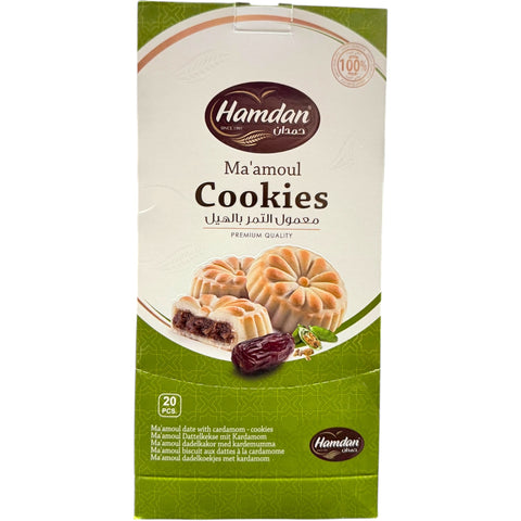 Hamdan – Date Maamoul with Cardamom cookies presented on a decorative plate.