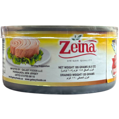 Zeina Tuna in Sunflower Oil with Chili – 185g displayed with fresh ingredients to emphasize flavor.