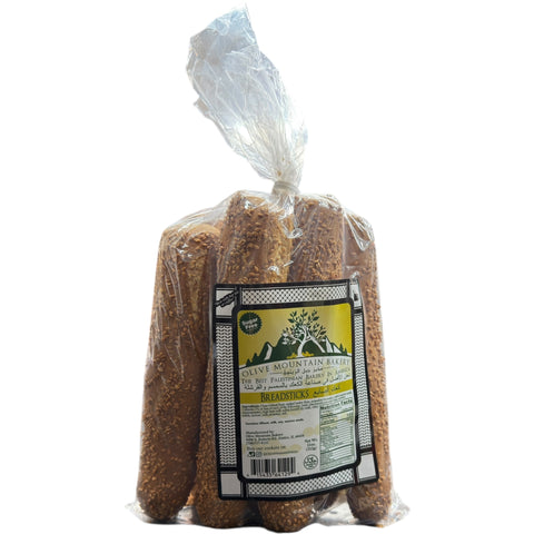 Sesame Breadsticks – Olive Mountain Bakery fresh and crispy breadsticks with a sprinkle of sesame seeds.