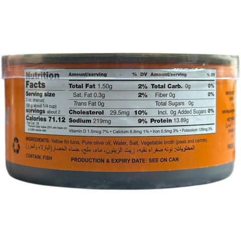 Milo Tuna in Olive Oil – 185g on a kitchen counter, ready to be added to a delicious meal.
