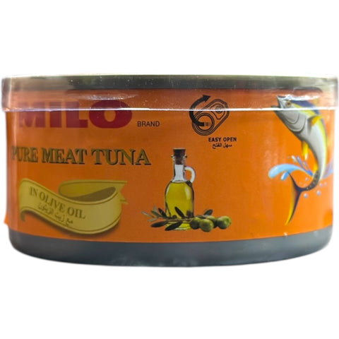 Milo Tuna in Olive Oil – 185g displayed with cooking utensils, highlighting its culinary use.