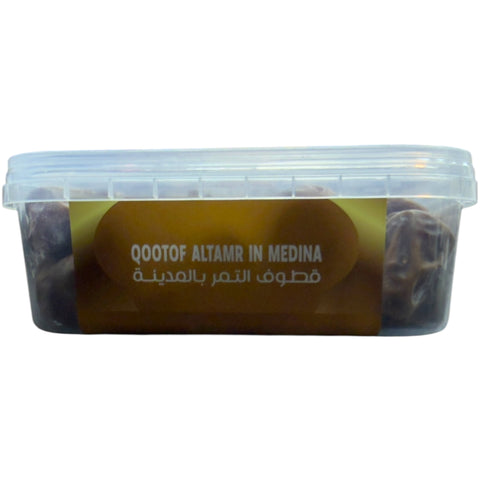 Qootof Altamr Sukkari Dates – 1kg with a soft focus background, emphasizing their appeal as a sought-after option for sukkari dates for sale.