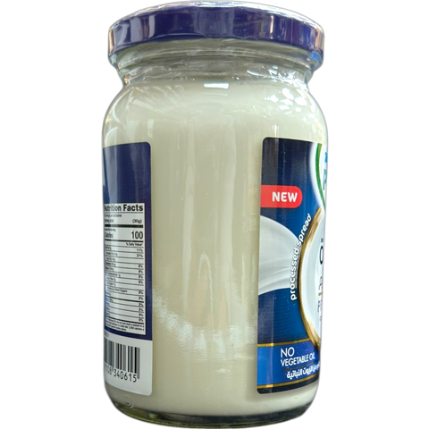 Close-up of PINAR PREMIUM PROCESSED CREAM CHEESE 240G showing its creamy texture, perfect for gourmet recipes with premium cream cheese.