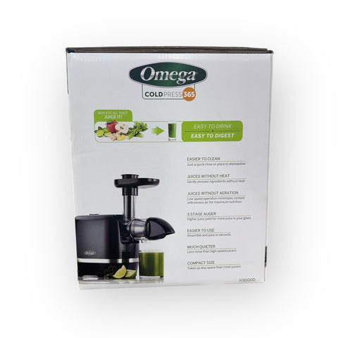 Omega Cold Press 365 Juicer with its accessories, including juice cones and cleaning brush, highlighting complete juicing experience.