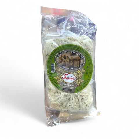 Seyidoğlu Antep Fıstıklı Pişmaniye 125 Gr - Traditional pistachio candy floss in a decorative package, showcasing the unique texture and green pistachio pieces.