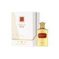 asdaaf-unisex-saud oud by Lattafa displayed on a wooden surface, highlighting its luxurious woodsy scent for men.