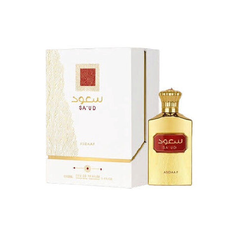 asdaaf-unisex-saud oud by Lattafa displayed on a wooden surface, highlighting its luxurious woodsy scent for men.