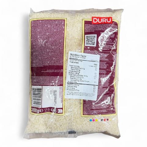 Close-up of Duru Baldo Rice 2KG, highlighting the long grain texture ideal for cooking.