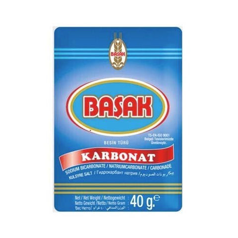 Packaging of Basak 40 Gr Sodium Bicarbonate with blue background and bold text indicating 'BASEK KARBONAT'. The packaging displays the product weight and contains multilingual descriptions.