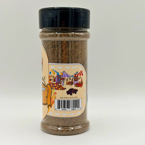ALBASHA Black Pepper Whole in a spice grinder, demonstrating the versatile use of aromatic black pepper in various recipes.