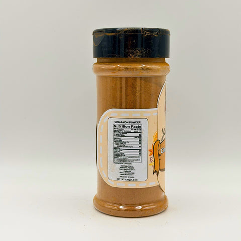 ALBASHA Ground Cinnamon – Pure Aromatic Spice, featuring a close-up of the pure aromatic cinnamon texture, perfect for baking and cooking.