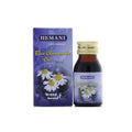 Hemani Blue Chamomile Oil 30ml bottle and box with chamomile flowers on packaging for soothing and healing skin care