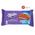 Milka Oreo Cream Cookie Sensations bar in purple packaging with image of cookie and Oreo cream filling