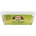 Ziyad brand Halva with Pistachio in a clear plastic container, showcasing the green label and detailing the product's weight of 12.34 ounces.