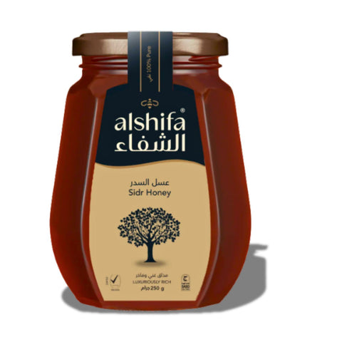 Pure Alshifa Sidr Honey – 250g in a clear jar showcasing its rich color and thick consistency, perfect for culinary and medicinal uses.